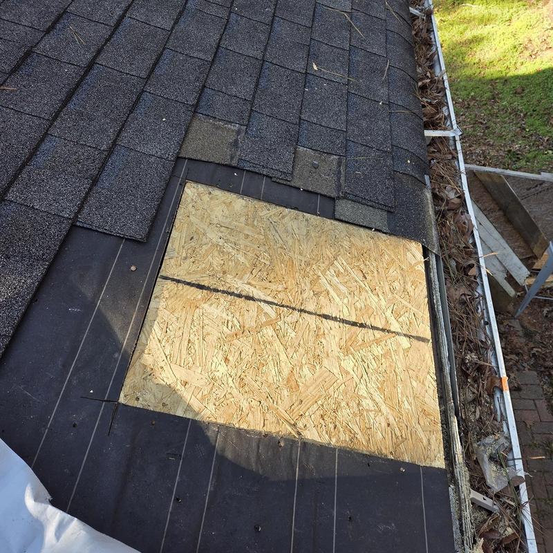 Roof decking replacement with surrounding shingles