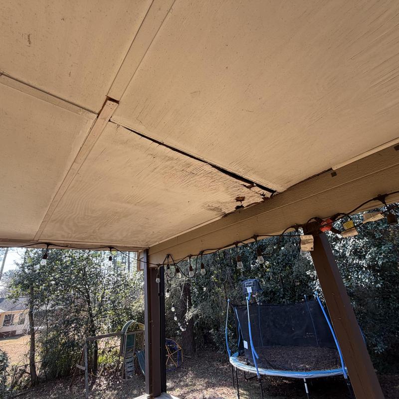 Porch ceiling with damaged plywood and trim needed