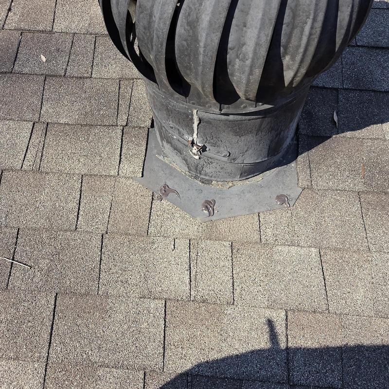 Pipe boot and roof decking with new caulking