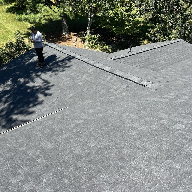 Black shadow shingle roof installation on home