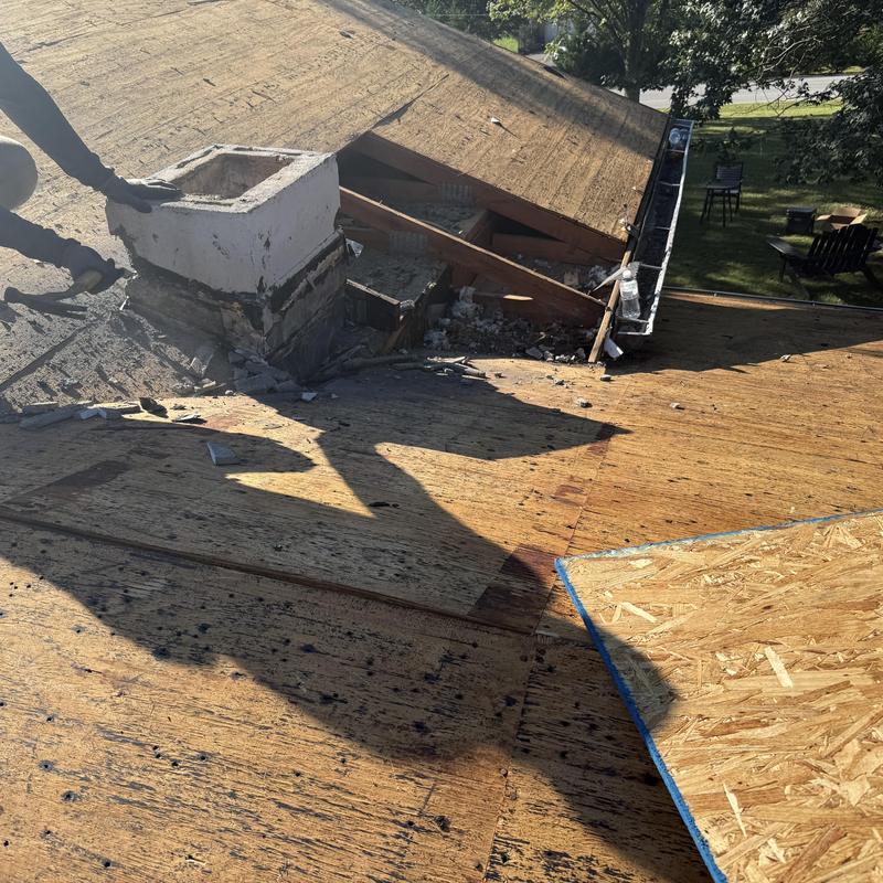 Roof decking replacement near chimney structure
