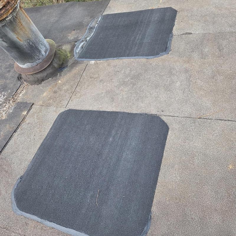Flat roof hot patch repairs near vent pipe