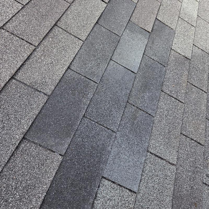 Asphalt shingles with recent replacements and caulking