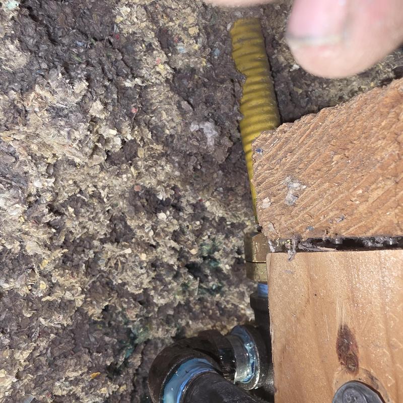 Gas line connector with yellow corrugated tubing