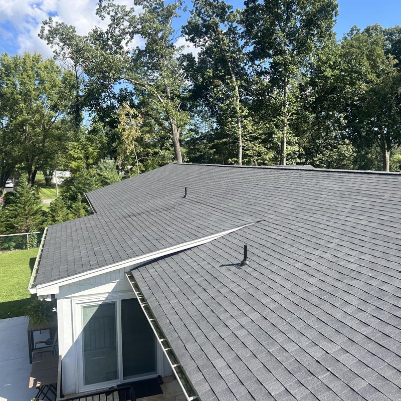 Black shadow asphalt shingles on residential roof