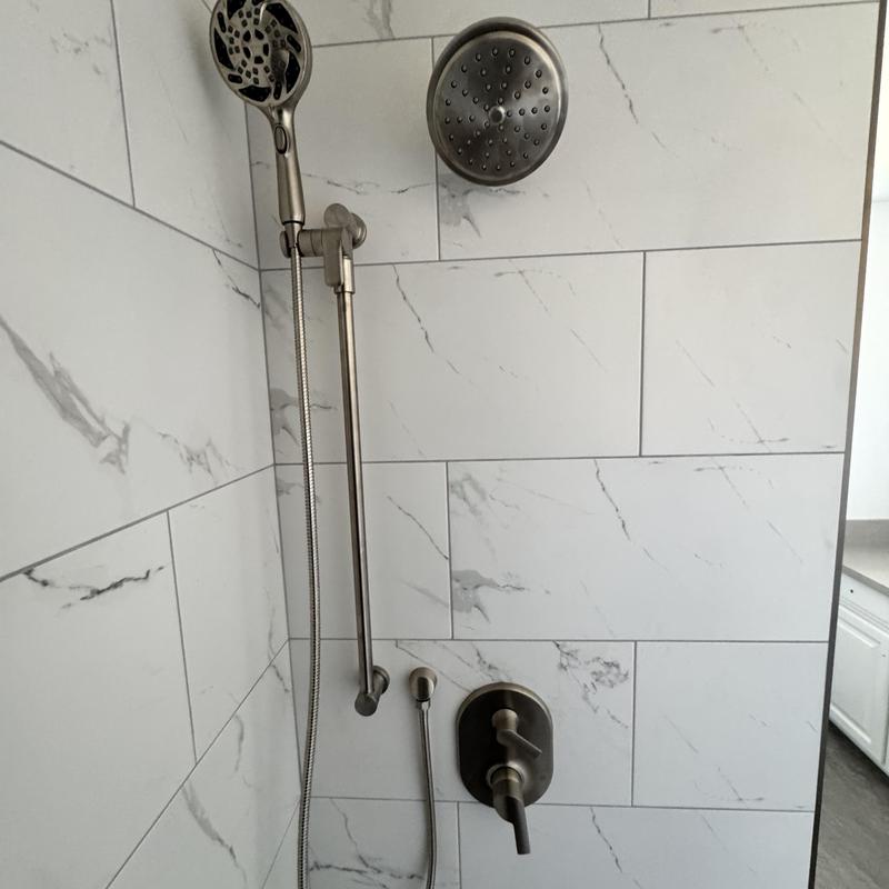 Shower system with handheld and fixed showerheads
