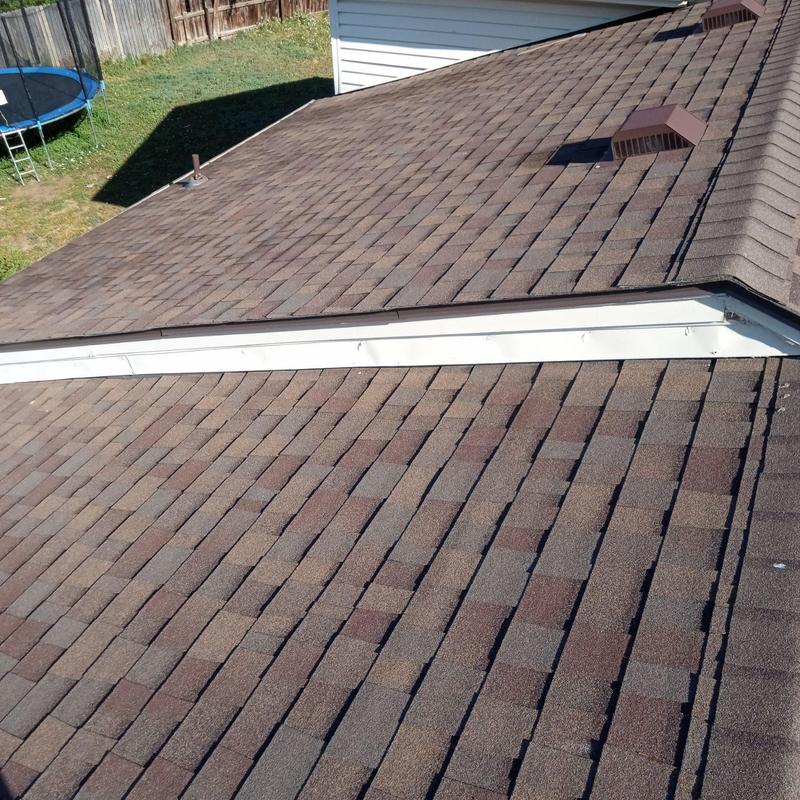 Asphalt shingle roof with pipe jacks and flashing inspection Asphalt shingle roof with pipe jacks and flashing inspection