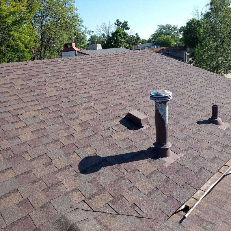 Shingle roof with pipe jacks and metal flashing Shingle roof with pipe jacks and metal flashing