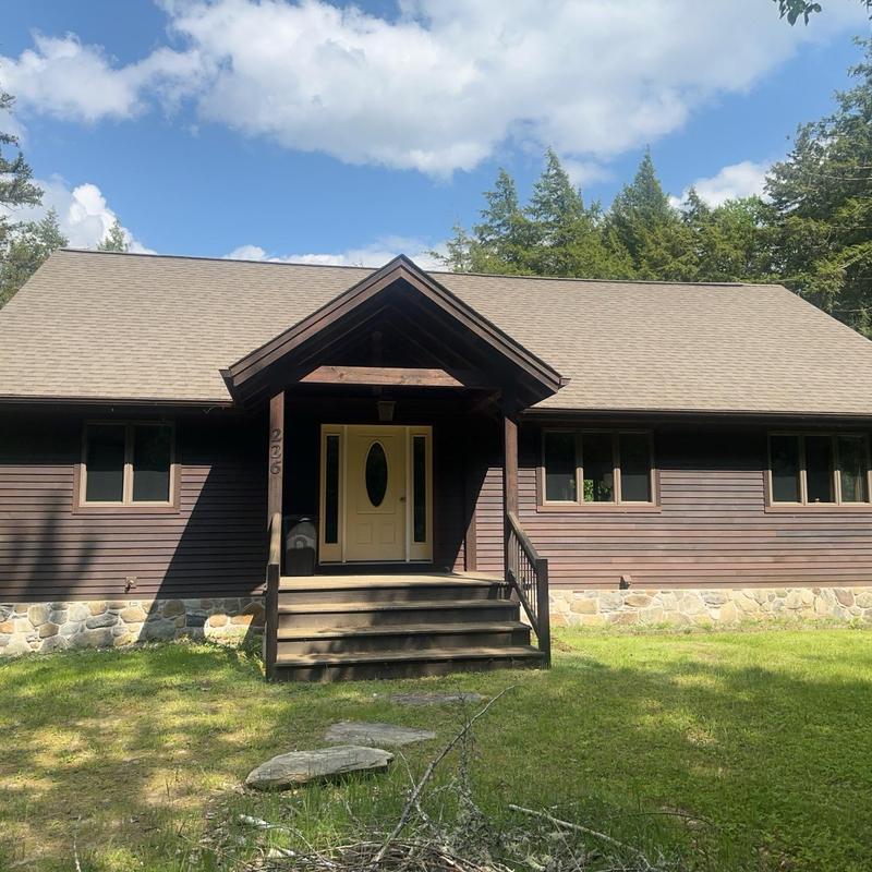 Owens Corning Duration shingle roof on rustic home