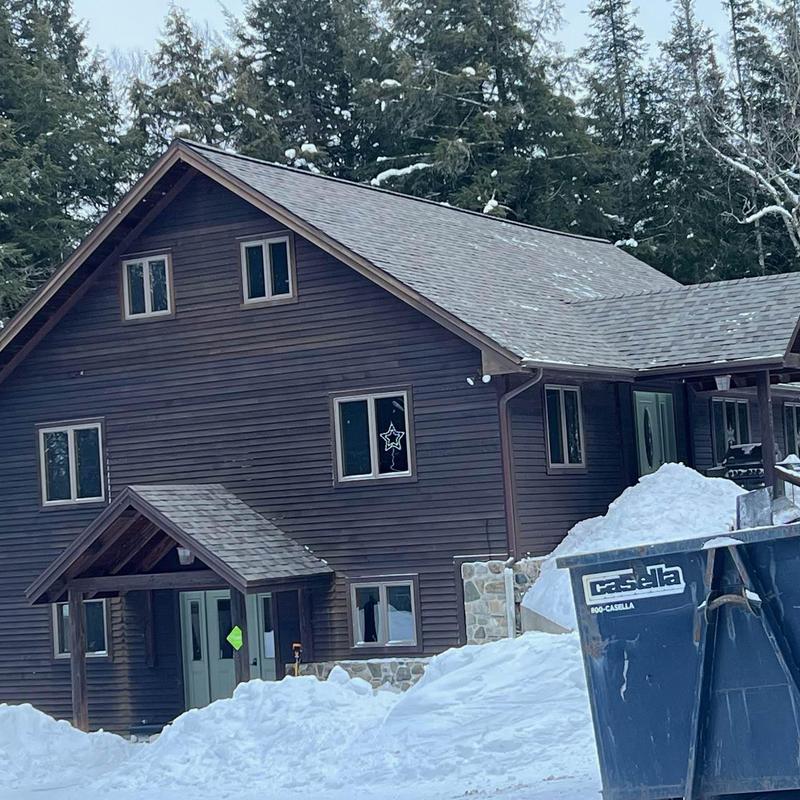 Owens Corning Duration shingle roof on snow-covered home