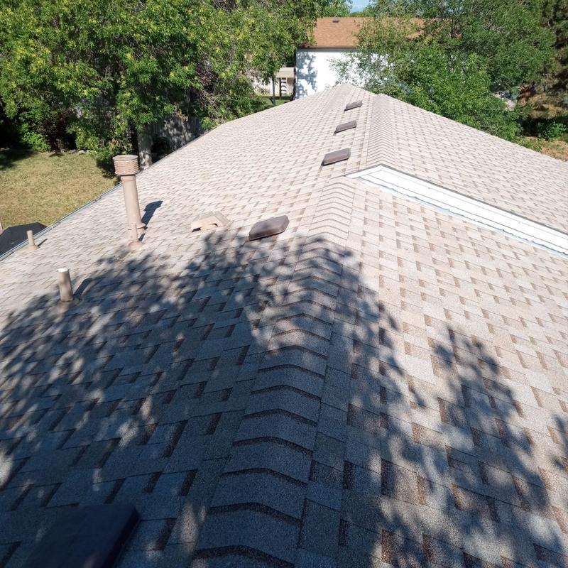 Asphalt shingle roof with vents and pipe jacks Asphalt shingle roof with vents and pipe jacks