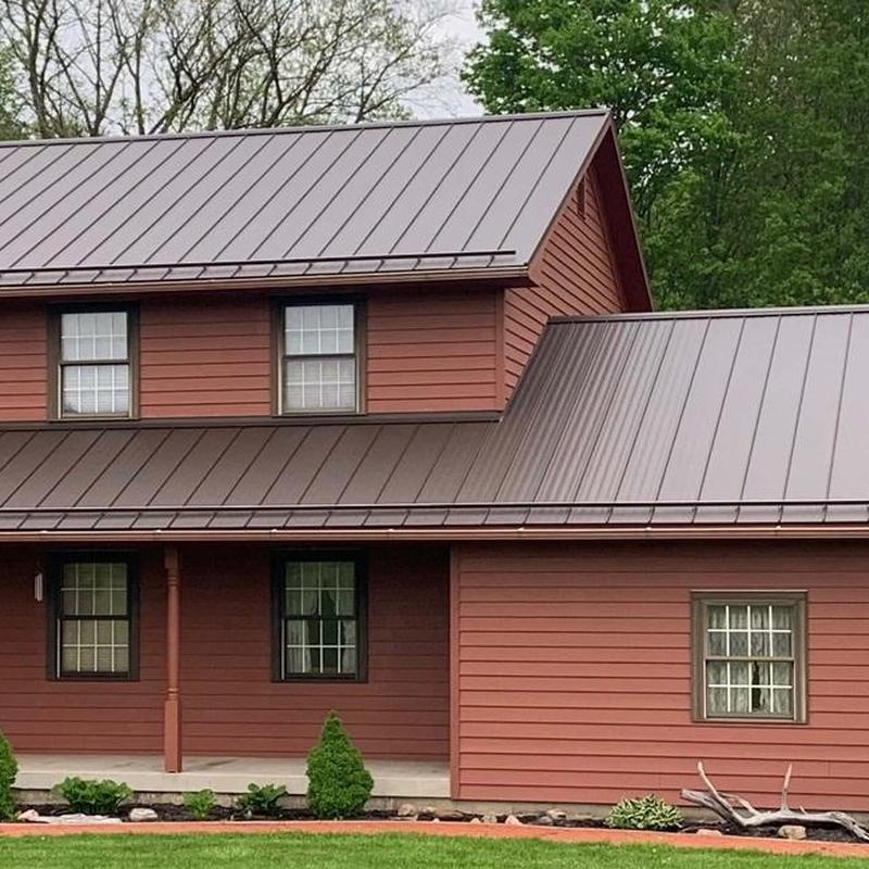 Corrugated metal roof with snow rails installation