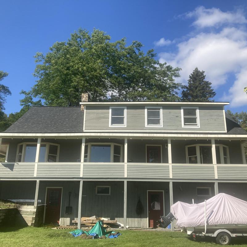 Asphalt shingle roof on two-story home in Stowe, VT