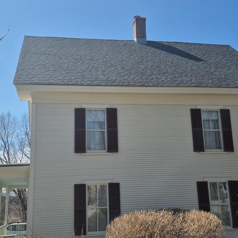 Asphalt shingle roof on residential house in Vermont