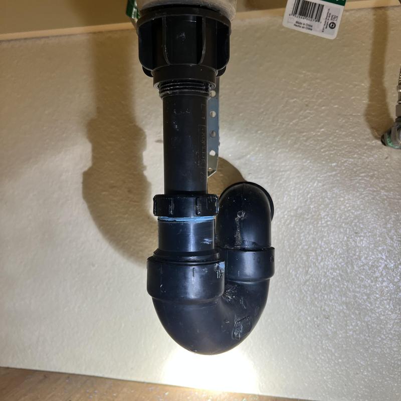 Pop-up drain assembly and plumbing under sink Pop-up drain assembly and plumbing under sink