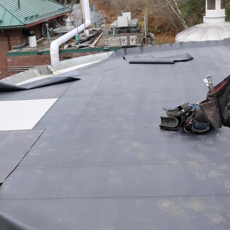 EPDM rubber roofing installation on municipal building EPDM rubber roofing installation on municipal building