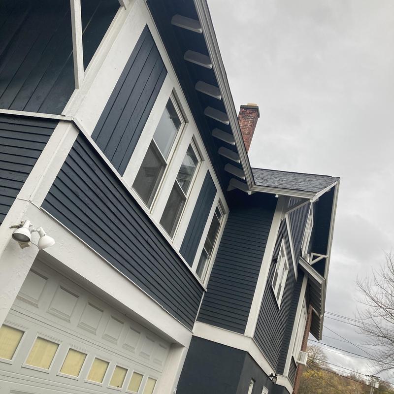 Asphalt shingle roof and siding on residential home