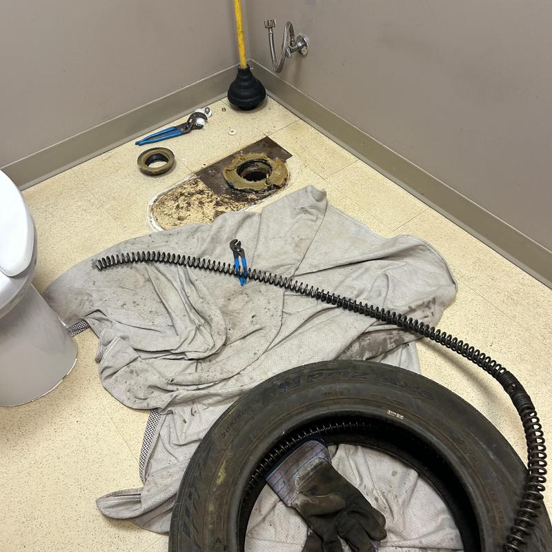 Main sewer line inspection with snake and tools