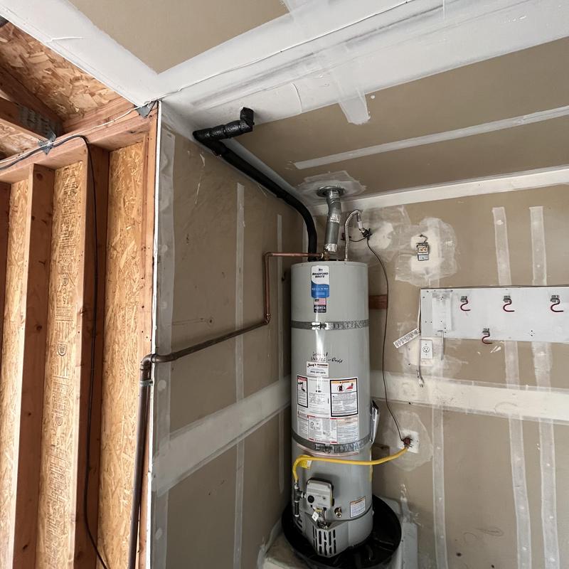 Water heater hot water main reroute to attic