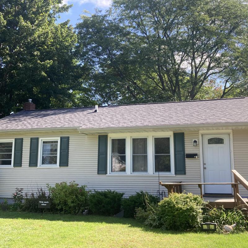Asphalt shingle roof with ventilation and flashing