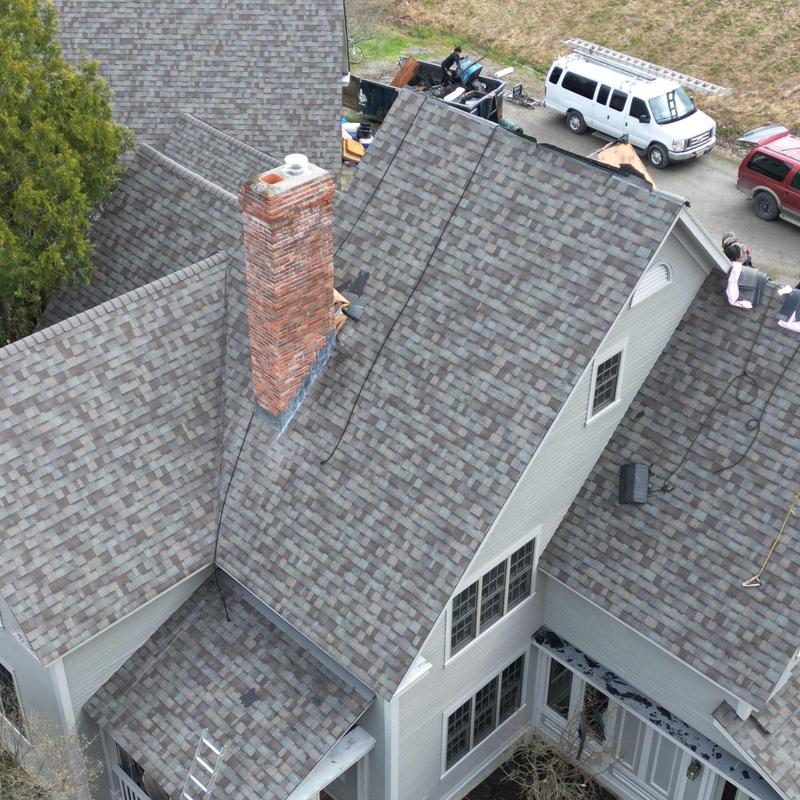 Asphalt shingle roof on a multi-level home in Waterbury VT