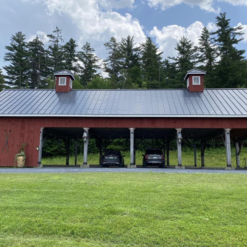 Standing seam metal roof with snow rails on garage