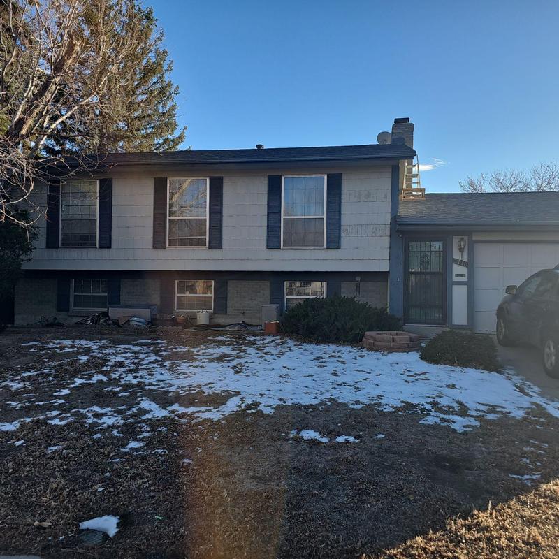 Rusted swamp cooler on residential roof in Thornton, CO Rusted swamp cooler on residential roof in Thornton, CO