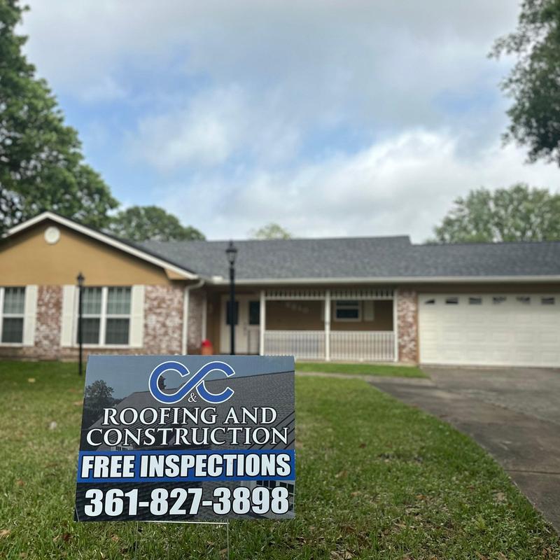 Residential asphalt shingle roof with free inspection sign Residential asphalt shingle roof with free inspection sign