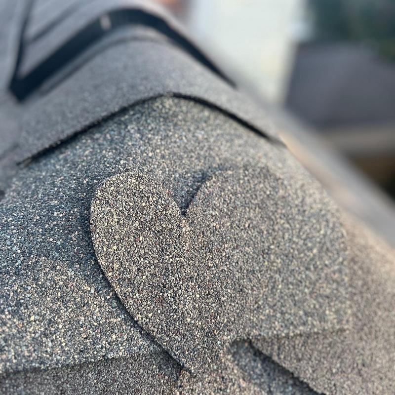 GAF Timberline HDZ shingle close-up with heart shape GAF Timberline HDZ shingle close-up with heart shape
