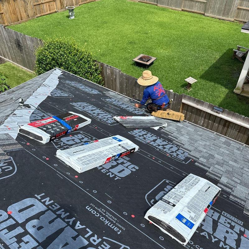 Tamko Titan XT Antique slate roof installation in backyard Tamko Titan XT Antique slate roof installation in backyard