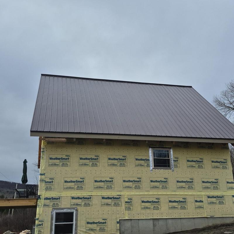 Corrugated metal roof on residential house in Vermont