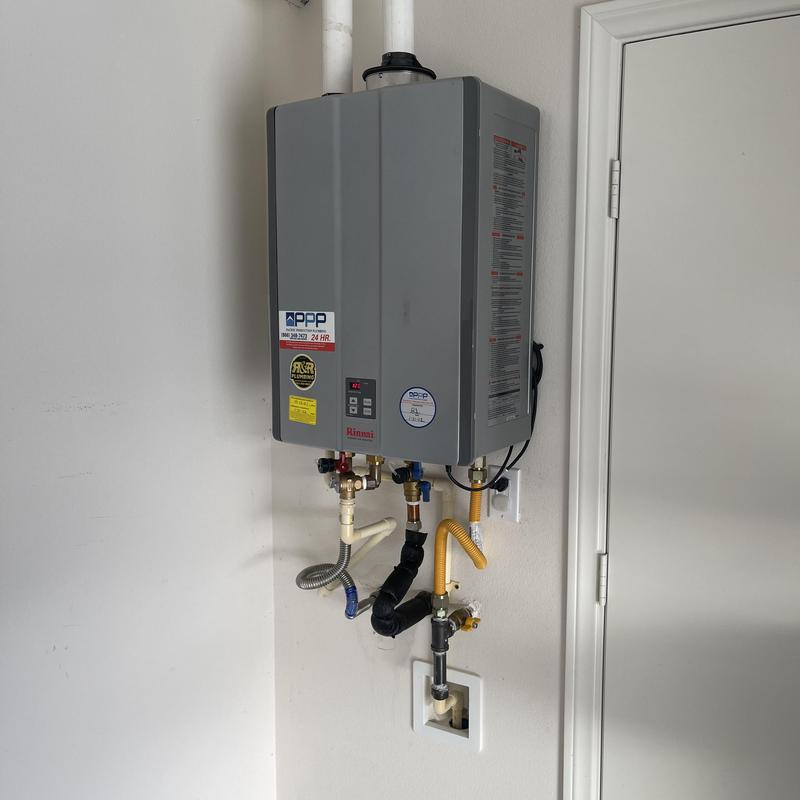 Tankless water heater with new stainless steel supply line