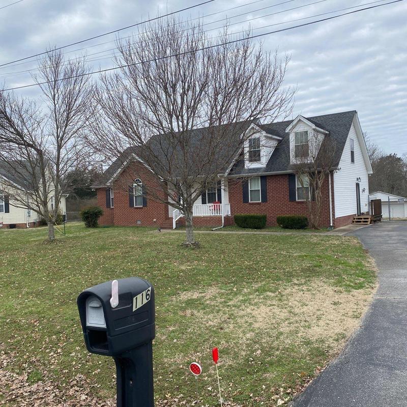 Asphalt shingle roof with hail damage inspection