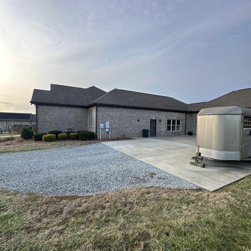 Roof shingles with hail damage and ridge caps inspection