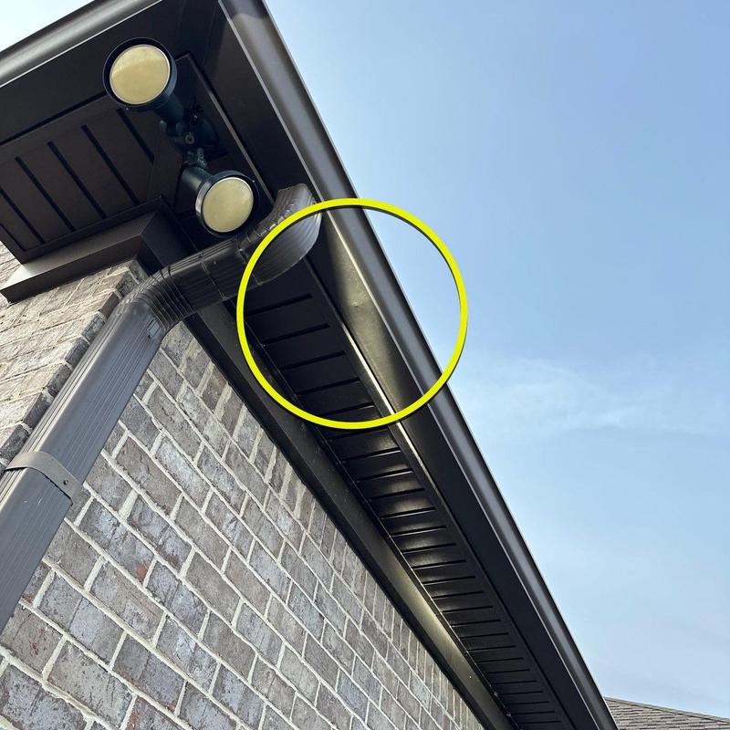 Gutter system with downspout and soffit vent inspection