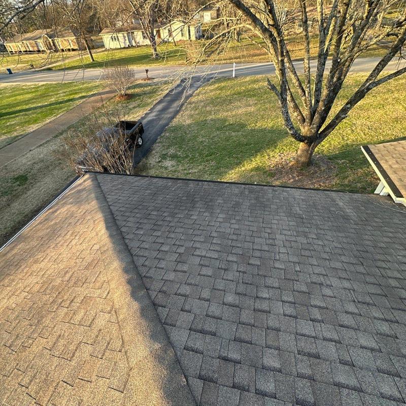 Asphalt shingle roof ridge and ventilation inspection