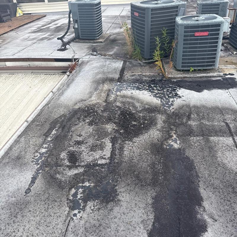 Modified bitumen roof damage near HVAC units