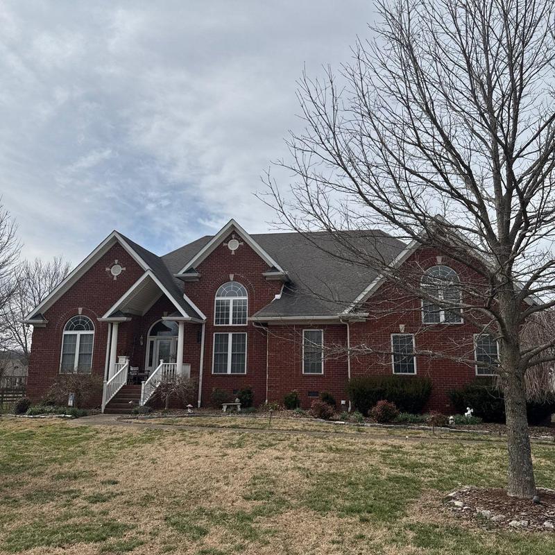 Asphalt shingle roof with hail damage inspection
