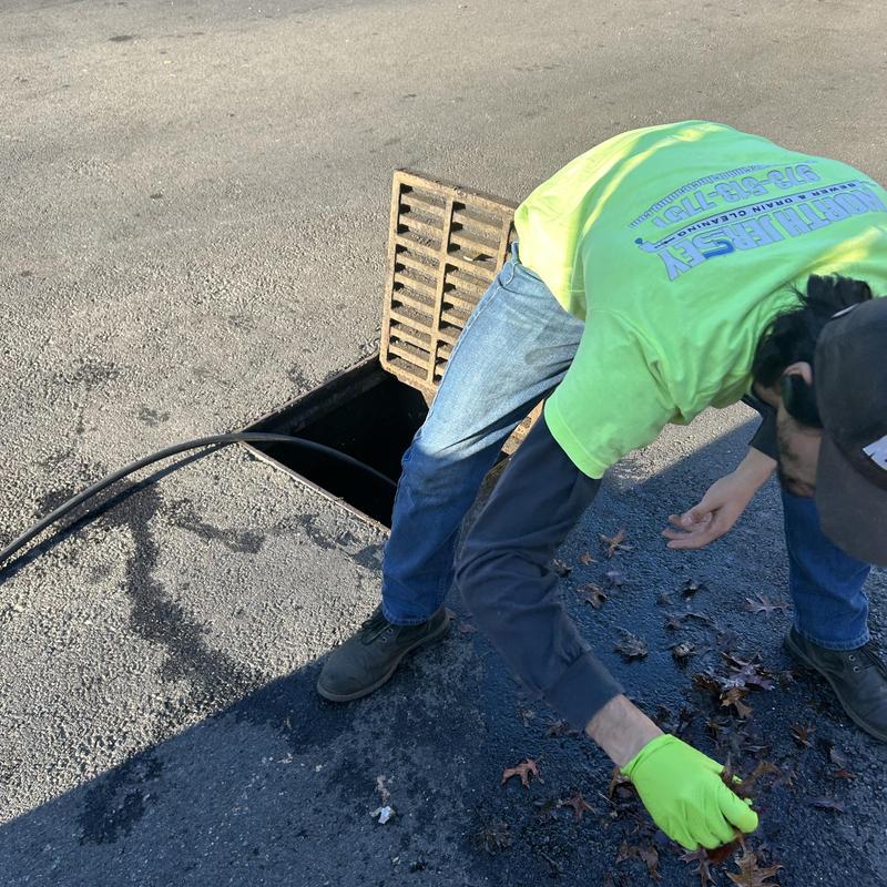 Storm drain grate cleaning with debris removal