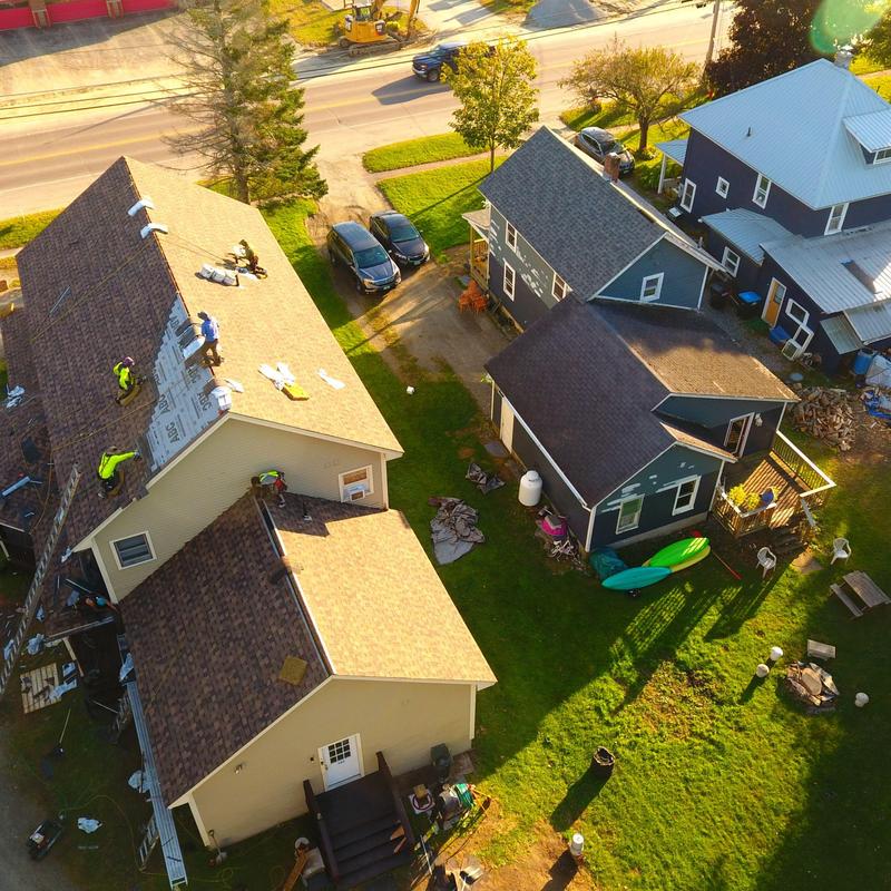 Asphalt shingle roofing installation on house in Vermont