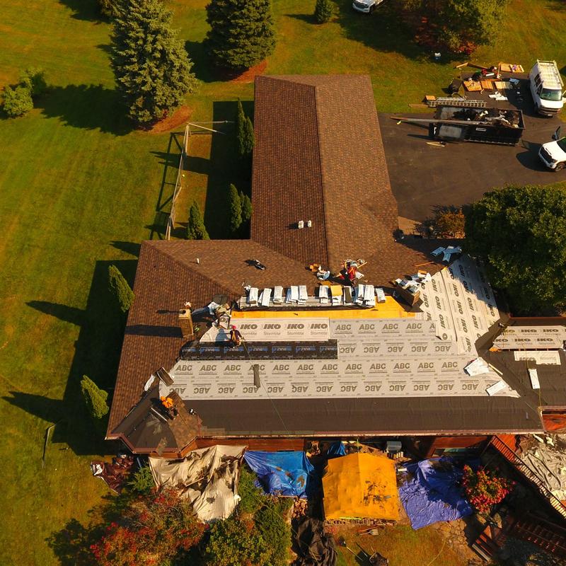 Lakefront roof with weather-resistant materials installation