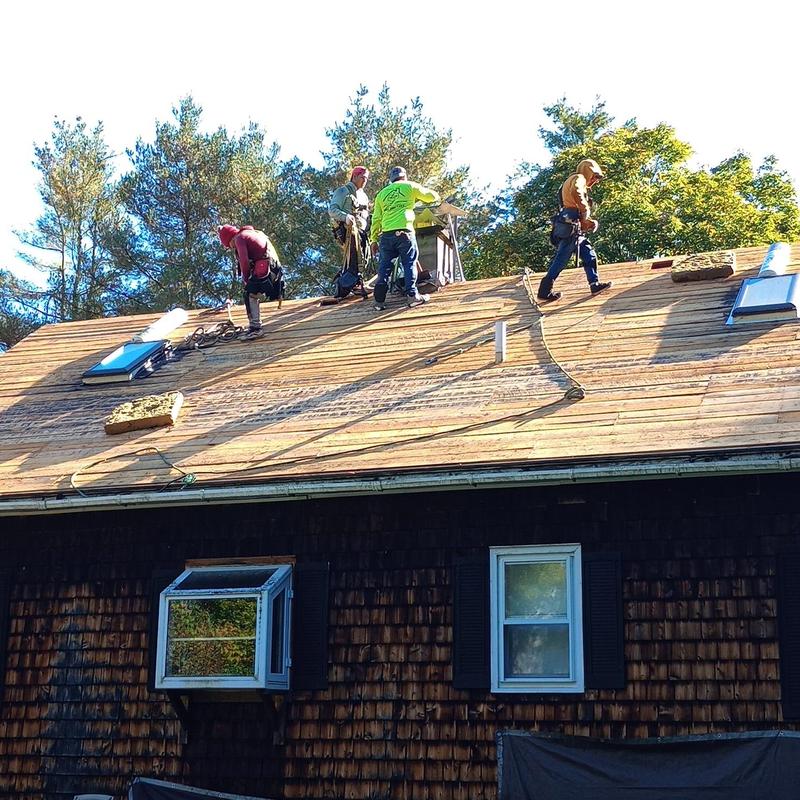 Roof deck replacement with new skylights installation