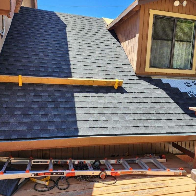 GAF lifetime asphalt roof installation on house