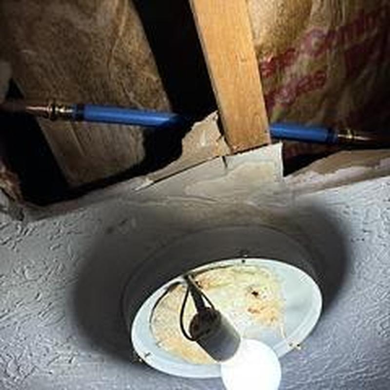 Pex water line installed in ceiling joist space