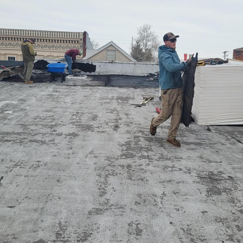 Flat commercial roof removal and insulation installation
