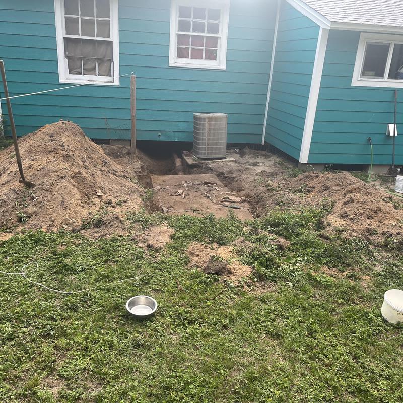 Schedule 40 DWV sewer pipe trench excavation and installation