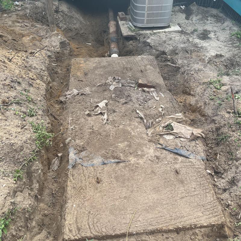 Schedule 40 DWV sewer piping installation trench