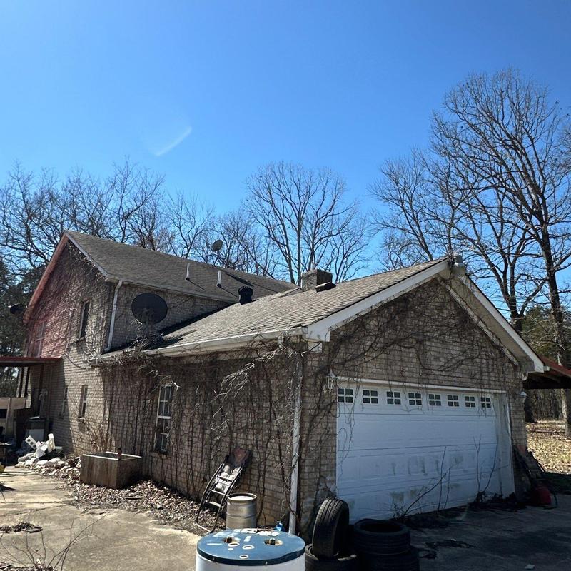 Asphalt shingle roof with vent and flashing inspection
