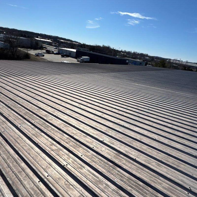 Metal commercial roof inspection and hail damage assessment