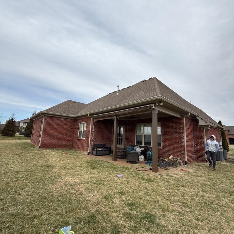 Asphalt shingle roof with hail damage inspection
